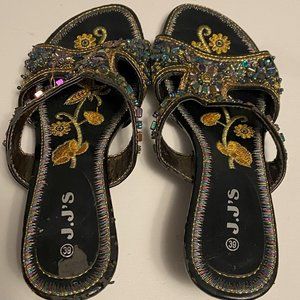 Beaded slip on sandals in black